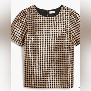 Gold and black crinkle metallic puff sleeve party top.